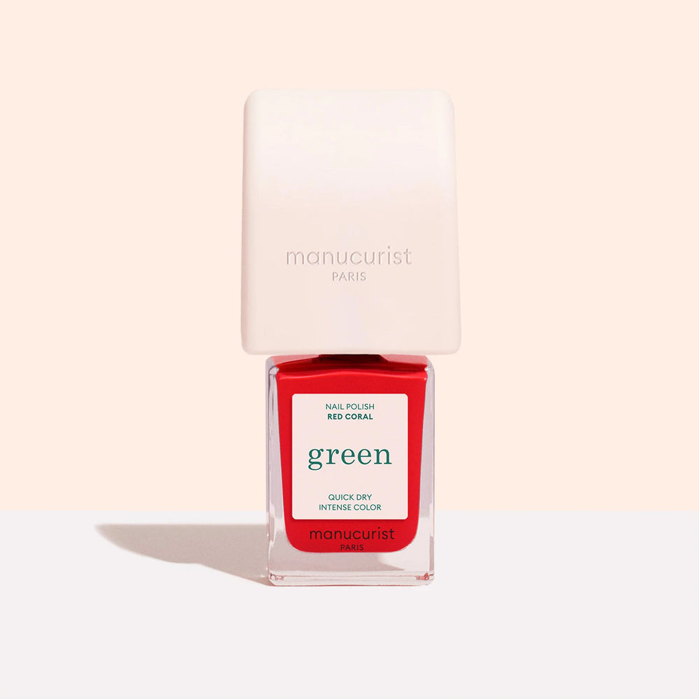 MANUCURIST Mani Helper tool designed to fit nail polish bottle caps for easier, more precise application.