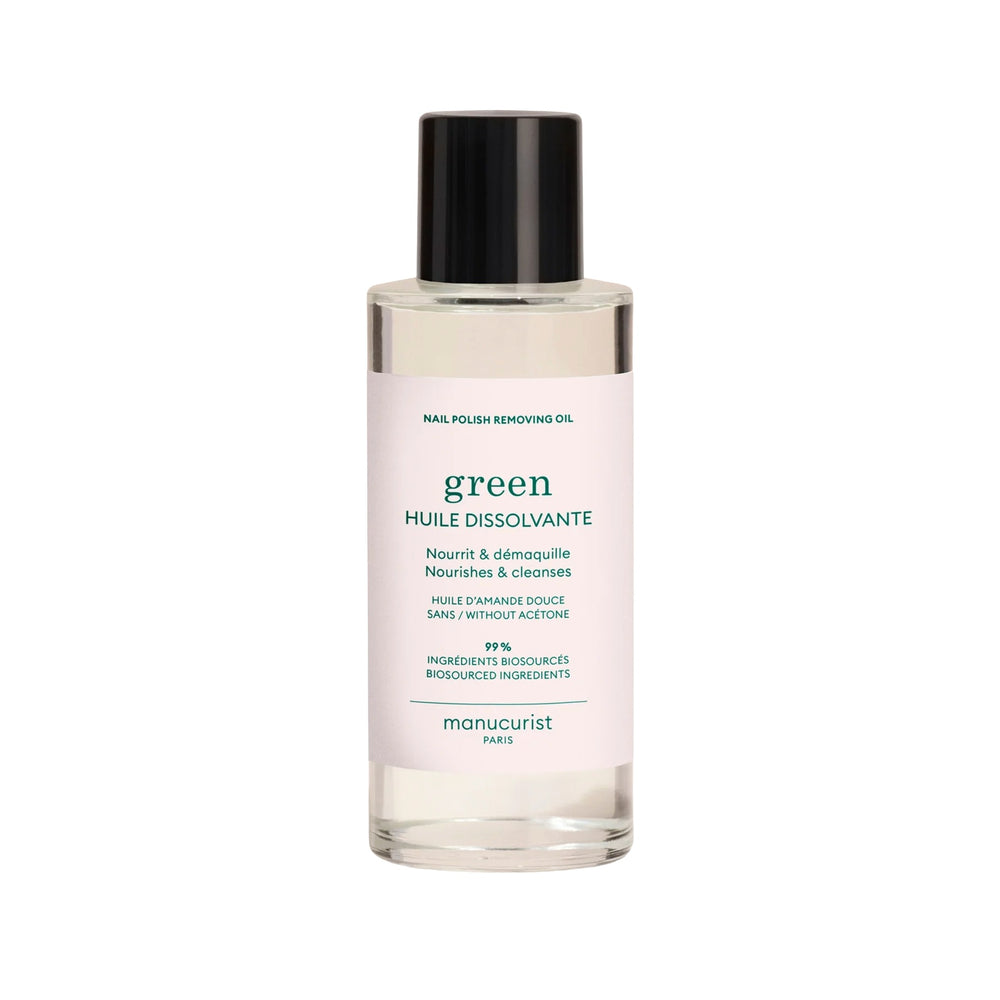Bottle of Manucurist Green™ Nail Polish Removing Oil with orange blossom scent, enriched with sweet almond oil for gentle and nourishing nail polish removal.