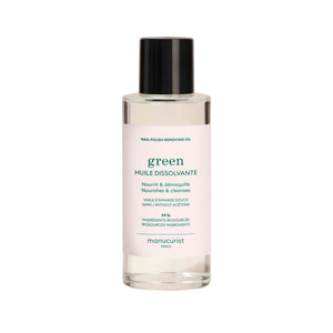 Bottle of Manucurist Green™ Nail Polish Removing Oil with orange blossom scent, enriched with sweet almond oil for gentle and nourishing nail polish removal.