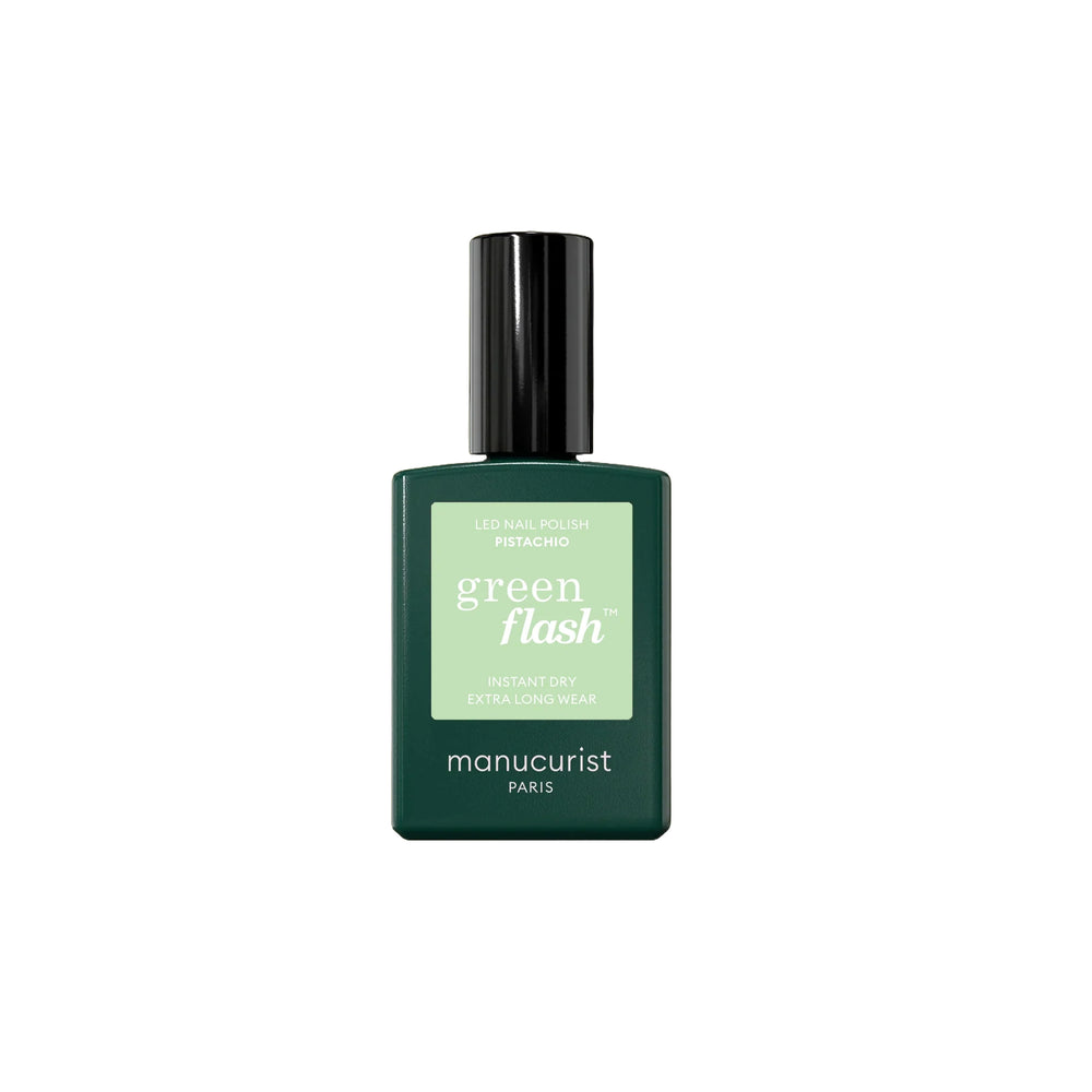Manucurist Green Flash™ Pistachio—a pale green LED gel polish with yellow undertones in a sleek 15ml bottle.