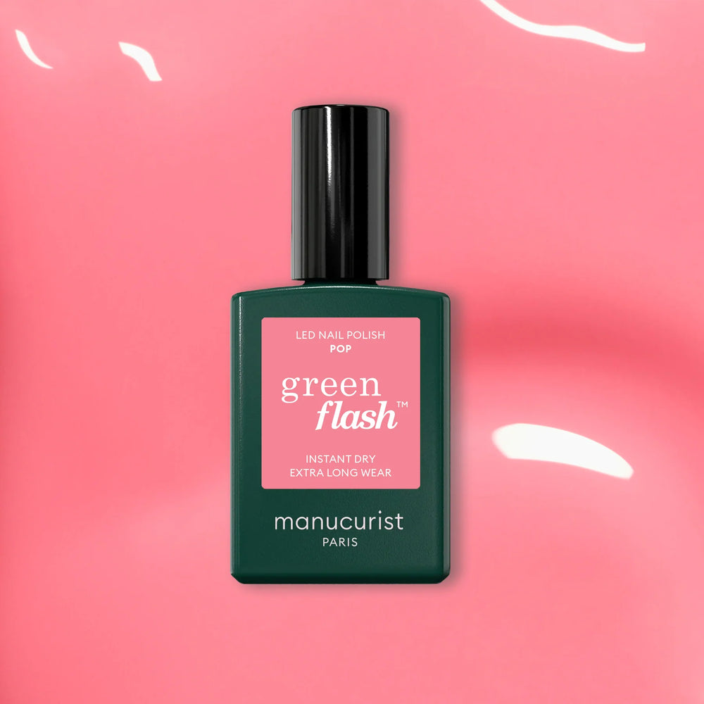 Manucurist Green Flash™ Pop—a bright electric pink LED gel polish with orange undertones in a sleek 15ml bottle.