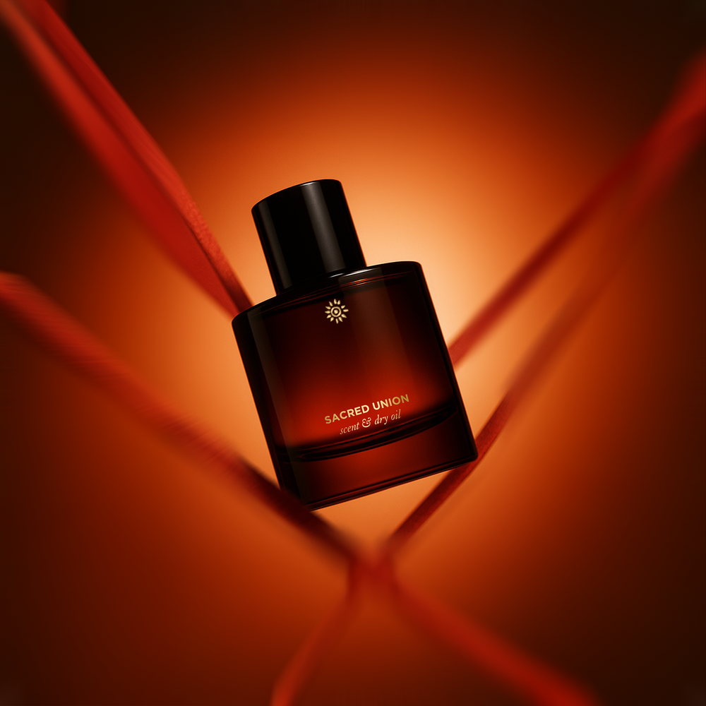 Brown bottle of MAULI RITUALS Sacred Union Scent & Dry Oil with a black cap on a white background