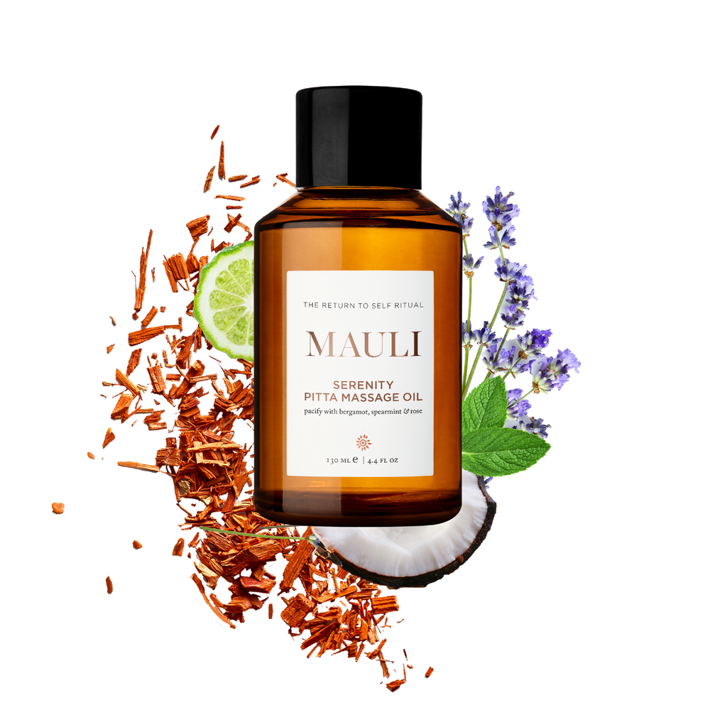 Glass amber bottle of Mauli Rituals Serenity Pitta Massage Oil on a white background