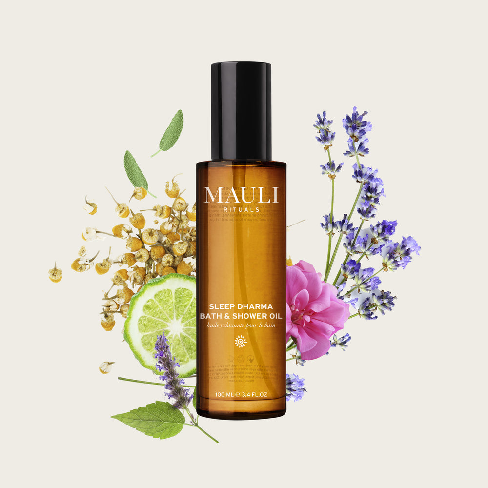 Glass bottle of Maui Rituals Sleep Dharma Bath & Shower Oil on a white background