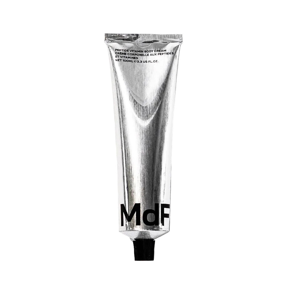 Silver tube of Peptide Vitamin Body Cream by MdF Beauty on a white background