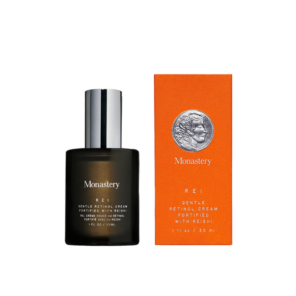 Bottle of Rei retinol serum displayed on a white background.