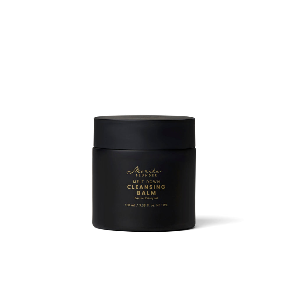 MONIKA BLUNDER BEAUTY Melt Down Cleansing Balm, a nourishing solid-to-cream cleanser with almond oil, rosehip oil, and squalane for soft, rejuvenated skin.