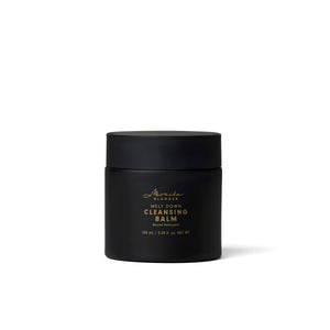 MONIKA BLUNDER BEAUTY Melt Down Cleansing Balm, a nourishing solid-to-cream cleanser with almond oil, rosehip oil, and squalane for soft, rejuvenated skin.