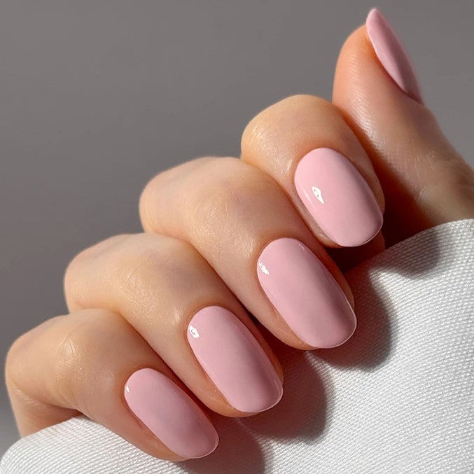 Bottle of NAILBERRY Kyoto Bloom nail polish in delicate pale pink with a smooth, opaque finish