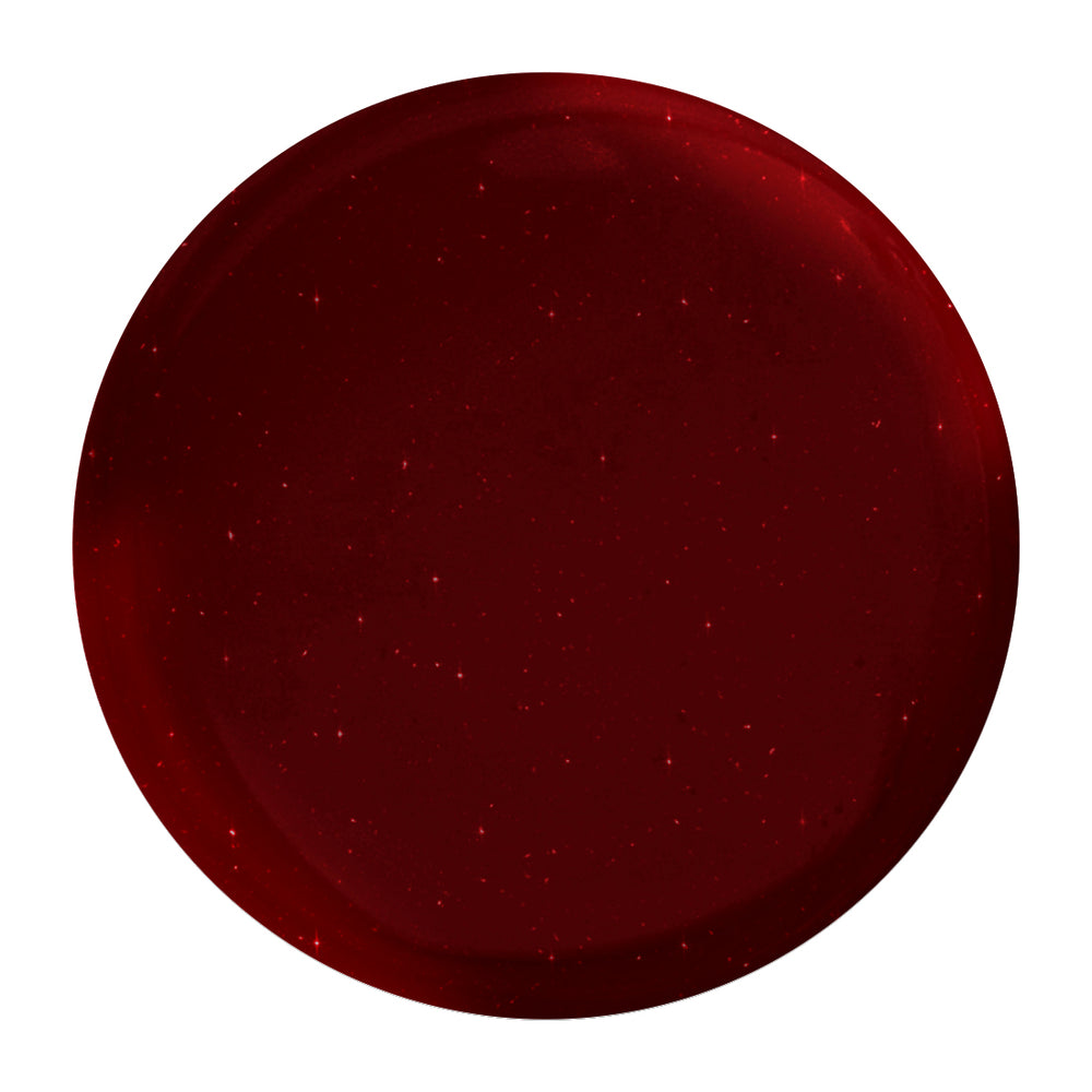 Bottle of NAILBERRY Very Merry Merlot nail polish in pearlised burgundy-black shade with shimmering, festive finish.