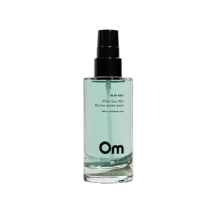 OM Organics Blue Azul After Sun Mist in a 105 ml bottle, featuring aloe vera, peppermint water, and coconut water to soothe and hydrate post-sun skin. Ideal for face and body, with a cooling peppermint and aloe scent.