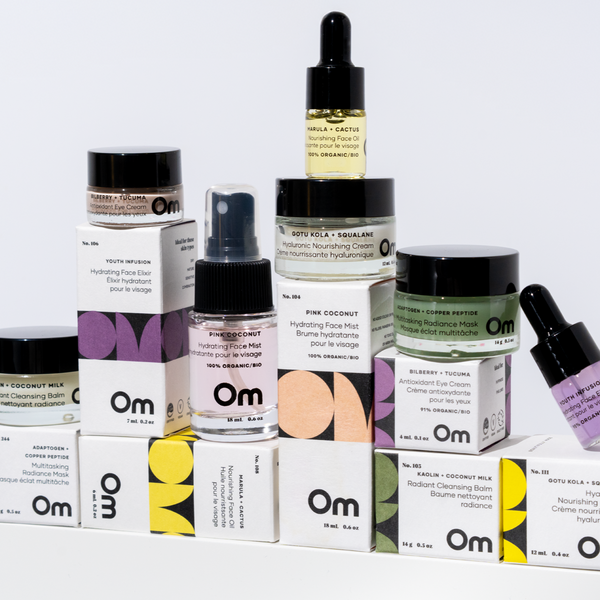 Collection of Om Organics skincare products on a white background