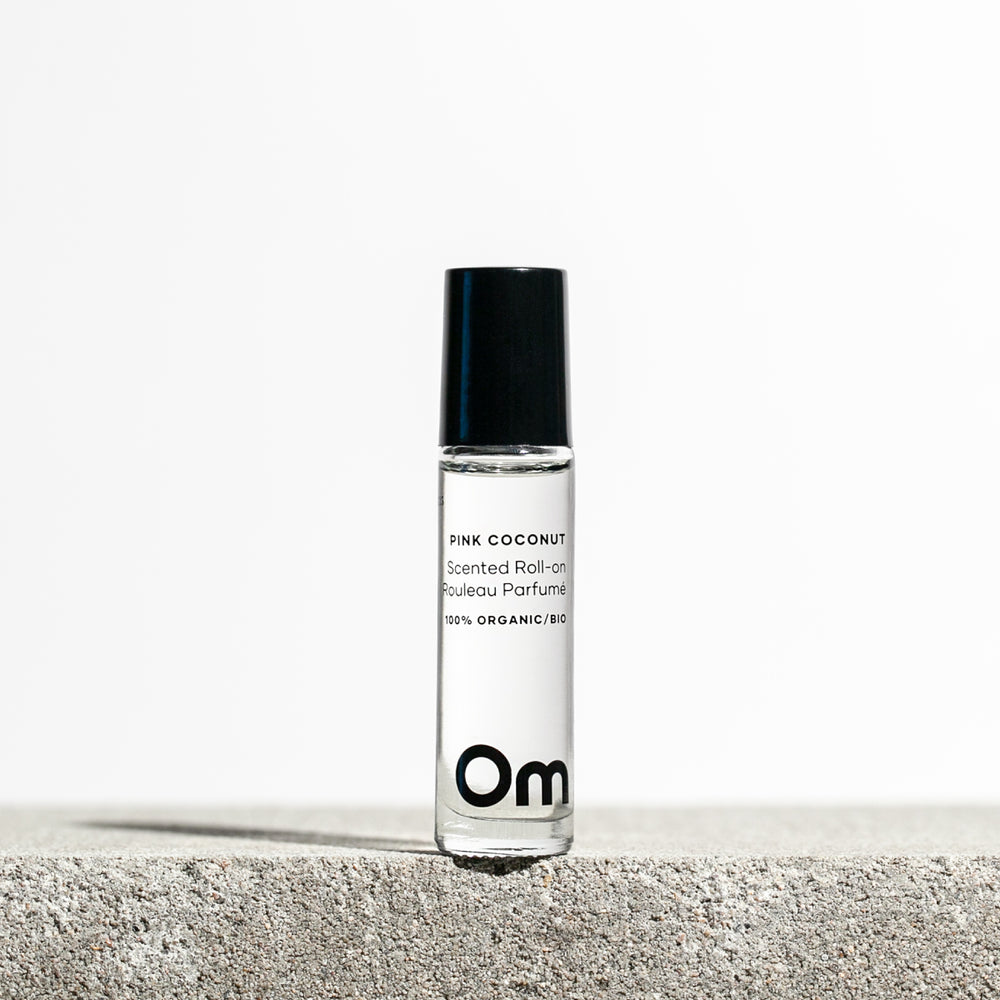 Om Organics Pink Coconut Scented Roll On – a warm coconut and rose fragrance in a roll-on bottle.