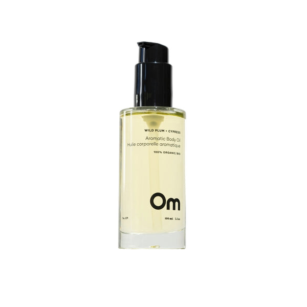 Om Organics Wild Plum + Cypress Aromatic Body Oil, a hydrating, nourishing oil for silky soft, glowing skin. Features sweet plum and woodsy cypress for a luxurious, all-over glow.