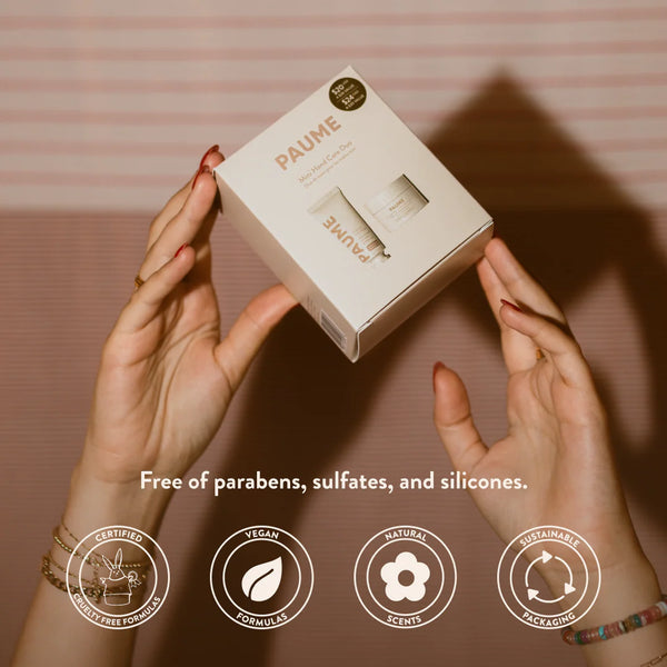 Hands holding a PAUME product box with branding and product details.
