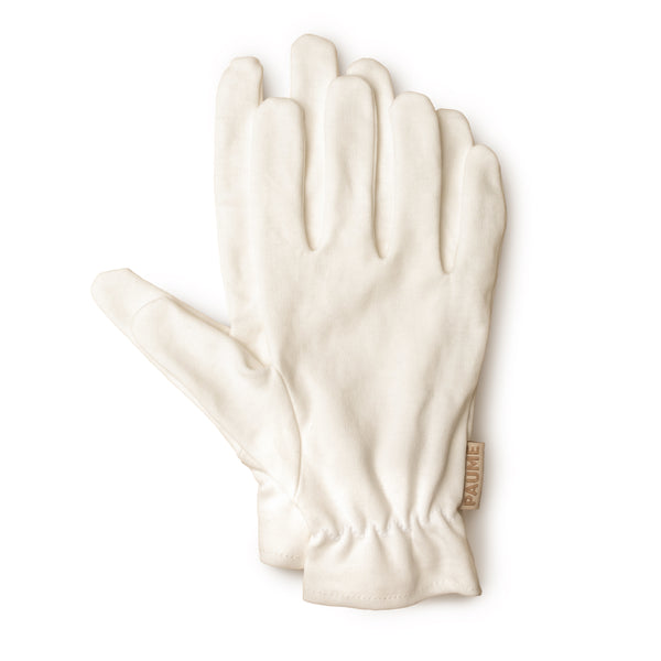 PAUME Overnight Hydration Gloves – 100% organic cotton gloves designed to deliver concentrated moisture for soft, hydrated hands by morning.