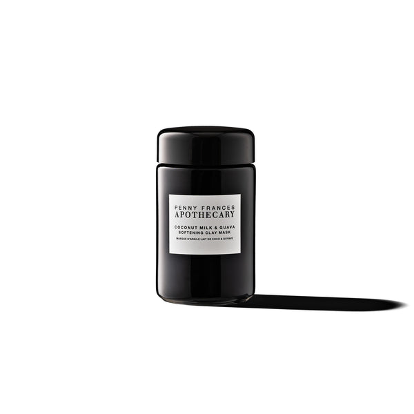 Glass jar of Penny Frances Apothecary Coconut Milk & Guava Softening Clay Mask with tropical fruit extracts, coconut milk, and rhassoul clay.