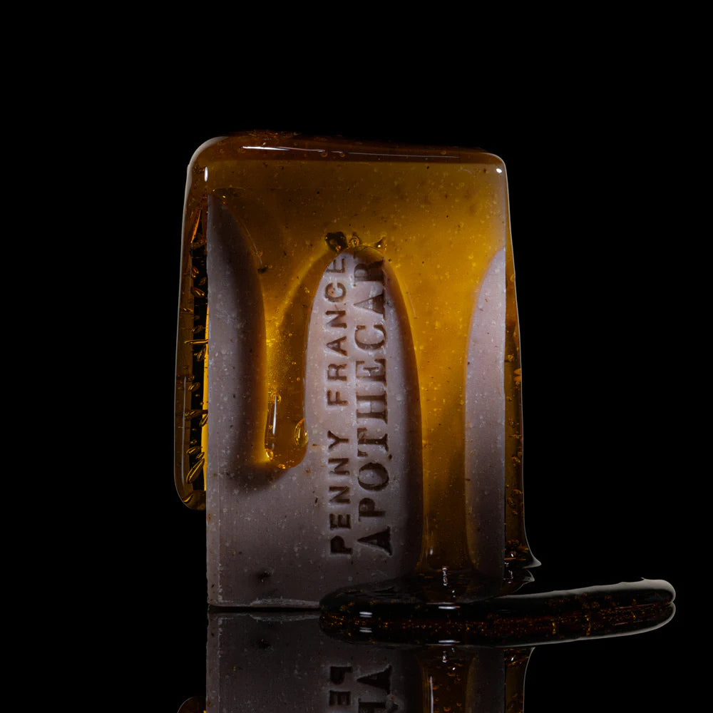 Lavender and violet botanical soap bar with cucumber, clay, and honey by Penny Frances Apothecary.