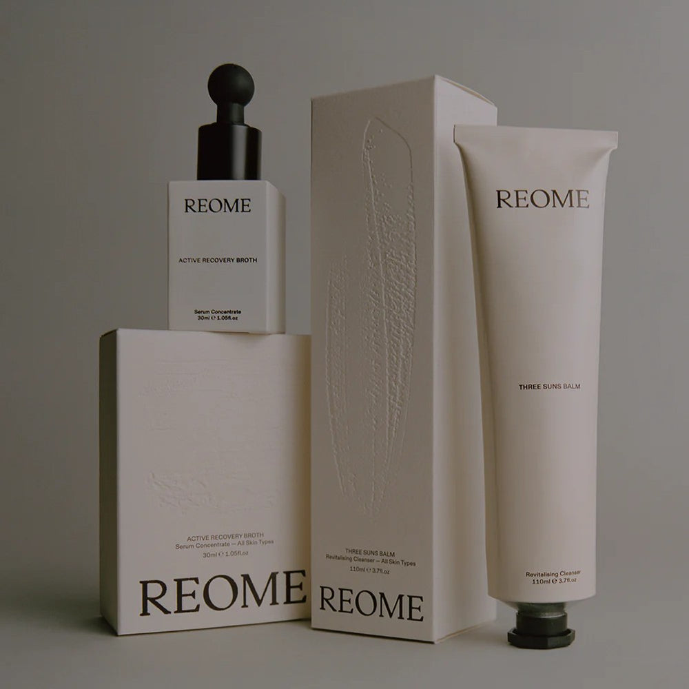 REOME The Bio-Glow Duo skincare set featuring the Three Suns Balm Cleanser and Active Recovery Broth serum, designed to cleanse and brighten the complexion.