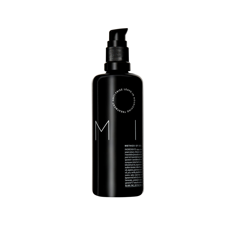 Bottle of REVERIE Milk Anti-Frizz Leave-In Nourishing Serum — a silicone-free, multi-tasking hair serum for all hair types that moisturizes, softens, and protects. full size