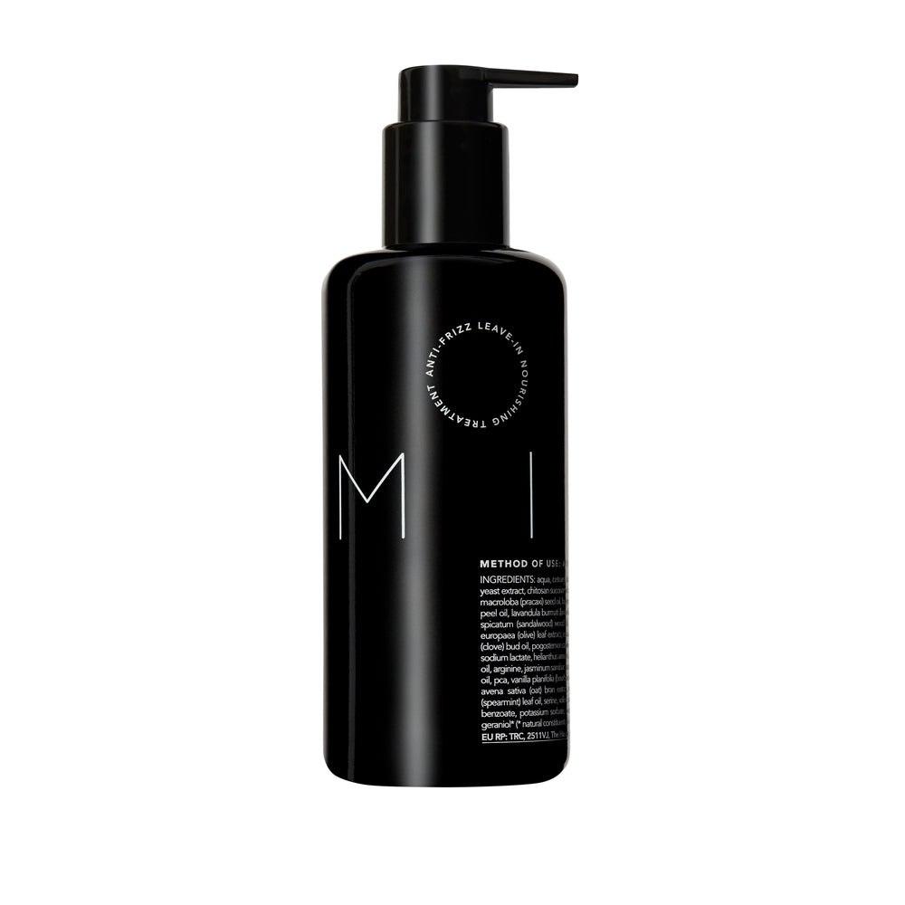 Bottle of REVERIE Milk Anti-Frizz Leave-In Nourishing Serum — a silicone-free, multi-tasking hair serum for all hair types that moisturizes, softens, and protects. full size