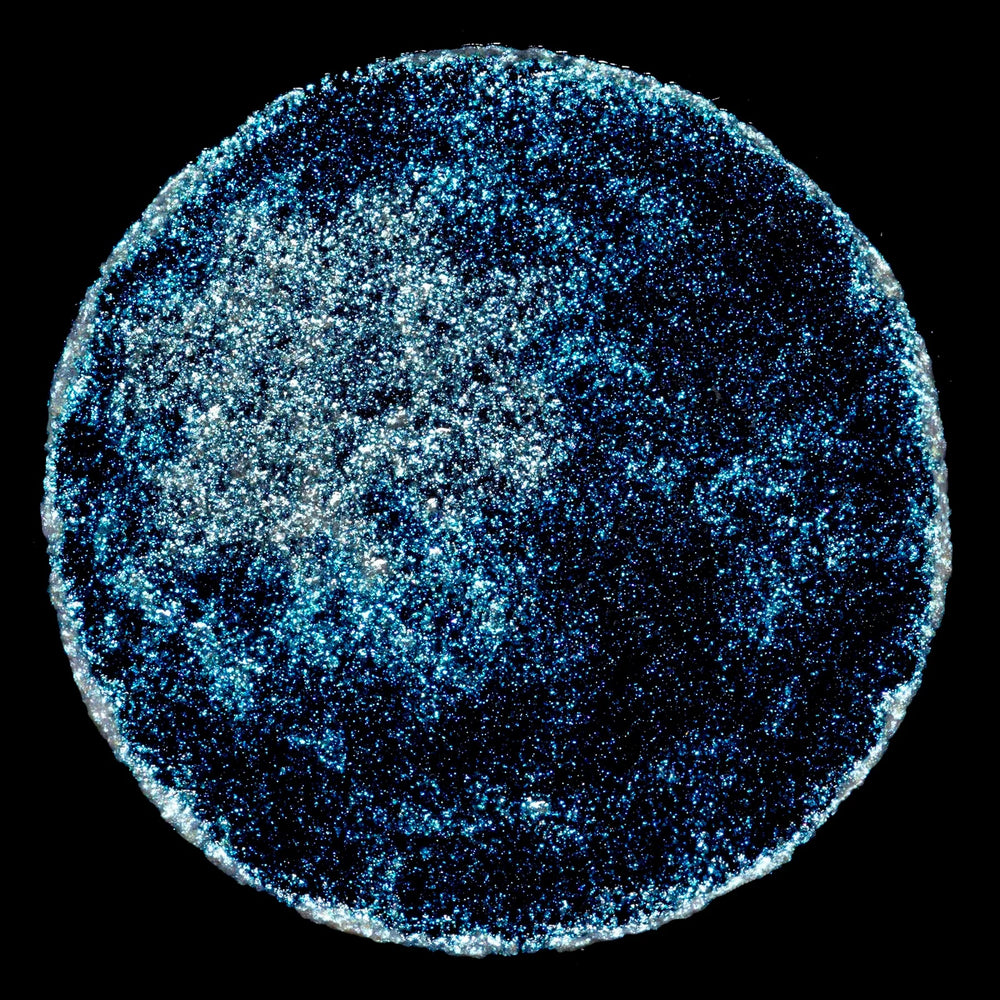 RITUEL DE FILLE Celestial Sphere Gelée Eye Gloss – Pyxis, iridescent blue-aqua gelée with shimmering effect, versatile for eyes, lips, and highlighting.