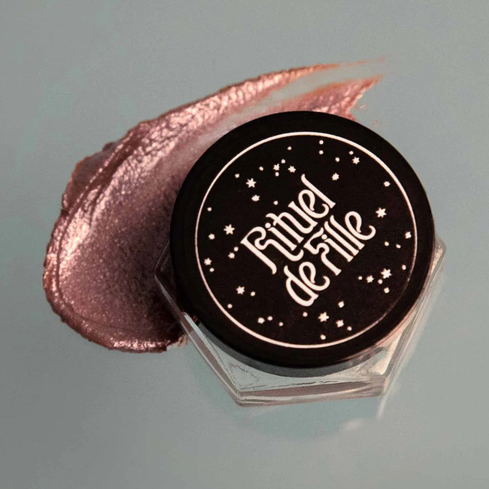 RITUEL DE FILLE Celestial Sphere Gelée Eye Gloss Solarium, mauve-taupe shimmering eye gloss with iridescent finish in a sleek compact jar.