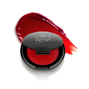 Rituel de Fille Color Nectar Pigment Balm in Bloodflower, cherry red jelly shade in compact.