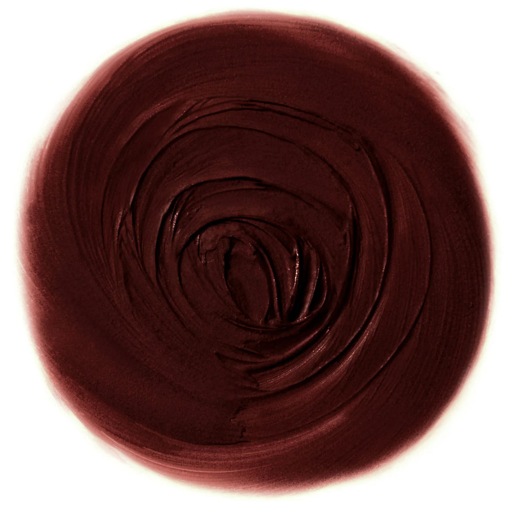 RITUEL DE FILLE Forbidden Lipstick Ravenous, deep dark red-brown semi-matte lipstick in a sleek black star-dusted tube.