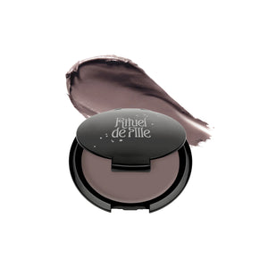 RITUEL DE FILLE Inner Glow Crème Pigment in Intuition, a soft gray taupe-mauve cream pigment housed in a starry black compact.