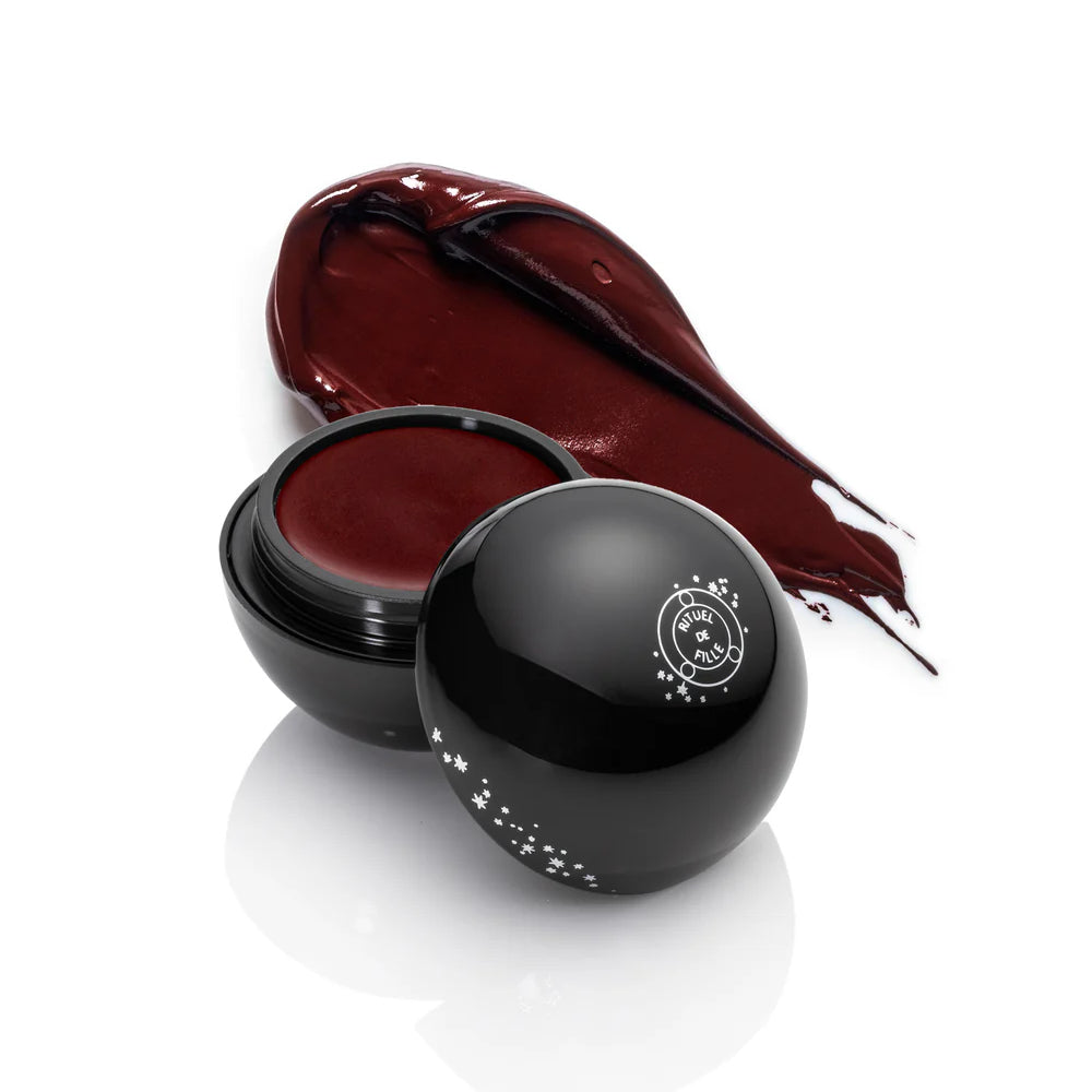 RITUEL DE FILLE Black Orb Enigmatic Kohl Eyeliner in Iron, deep sultry red semi-matte crème eyeliner.