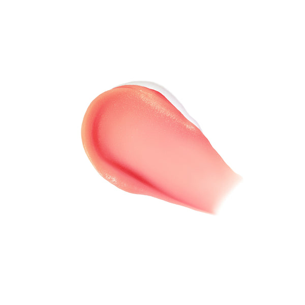 Pink lip balm smear on a white background. RMS BEAUTY Liplights Cream Lip Gloss Chameleon
