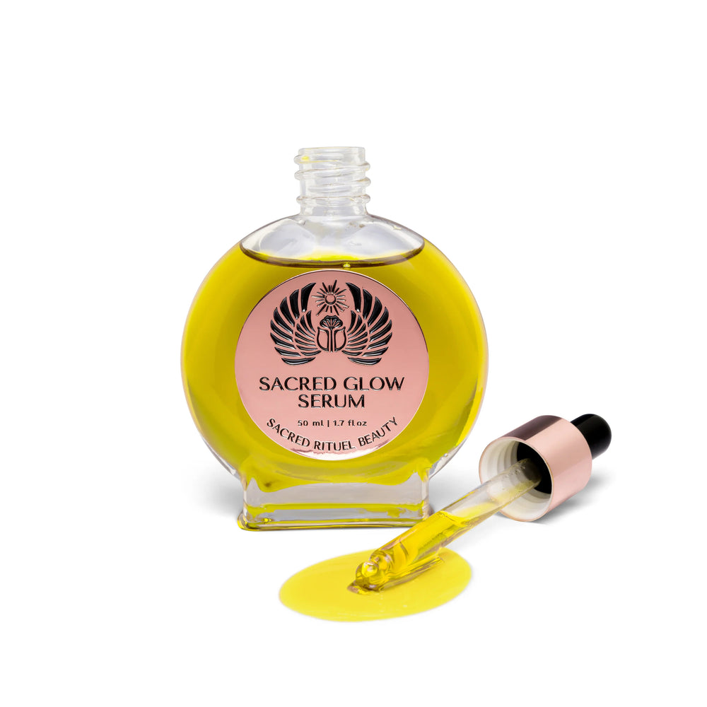 Sacred Rituel Sacred Glow Serum bottle with golden-hued botanical oil, formulated for a balanced, luminous skin appearance.