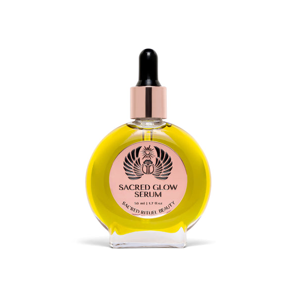 Sacred Rituel Sacred Glow Serum bottle with golden-hued botanical oil, formulated for a balanced, luminous skin appearance.