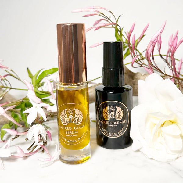 SACRED RITUEL Sacred Glow Travel Set with travel-size Sacred Rose Mist and Sacred Glow Serum in an eco pouch—organic skincare for hydration and radiance.