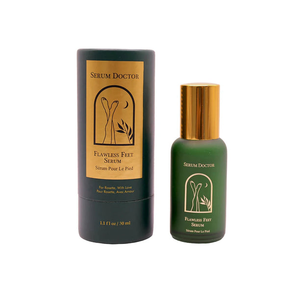 Serum Doctor Flawless Feet Serum shown with its dark green cylindrical packaging tube and the matching green bottle with a metallic gold cap on a white background.