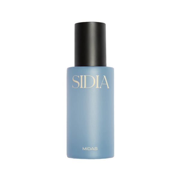 Blue bottle of SIDIA The Body Mist in scent Midas on white background