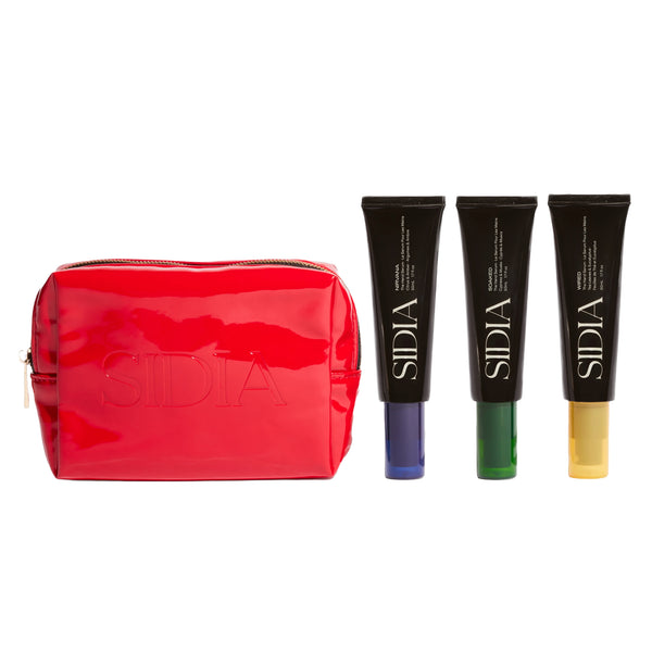 Red cosmetic bag with Sidia hand creams on a white background