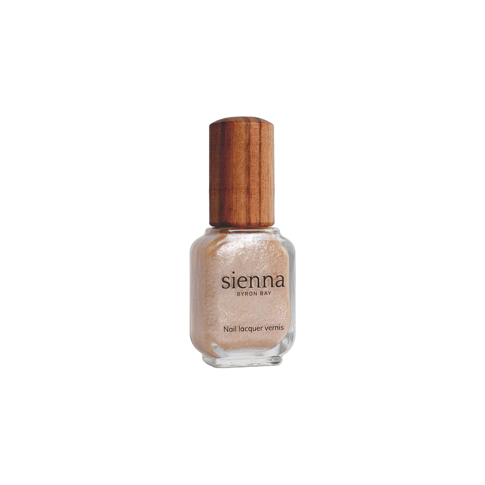 Sienna Byron Bay Embrace Nail Polish – soft grapefruit shimmer in sustainable packaging.