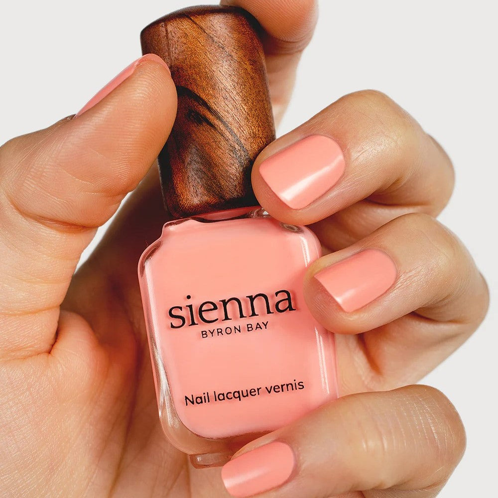 SIENNA BYRON BAY Joy Nail Polish in Vibrant Peach Crème – a lively, sun-kissed shade with a smooth finish.