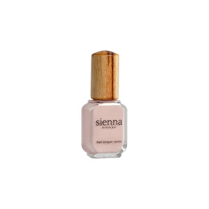 Sienna Byron Bay Serenity Nail Polish in Champagne Crème – a pastel pink champagne shade with a smooth crème finish. Vegan and eco-friendly.