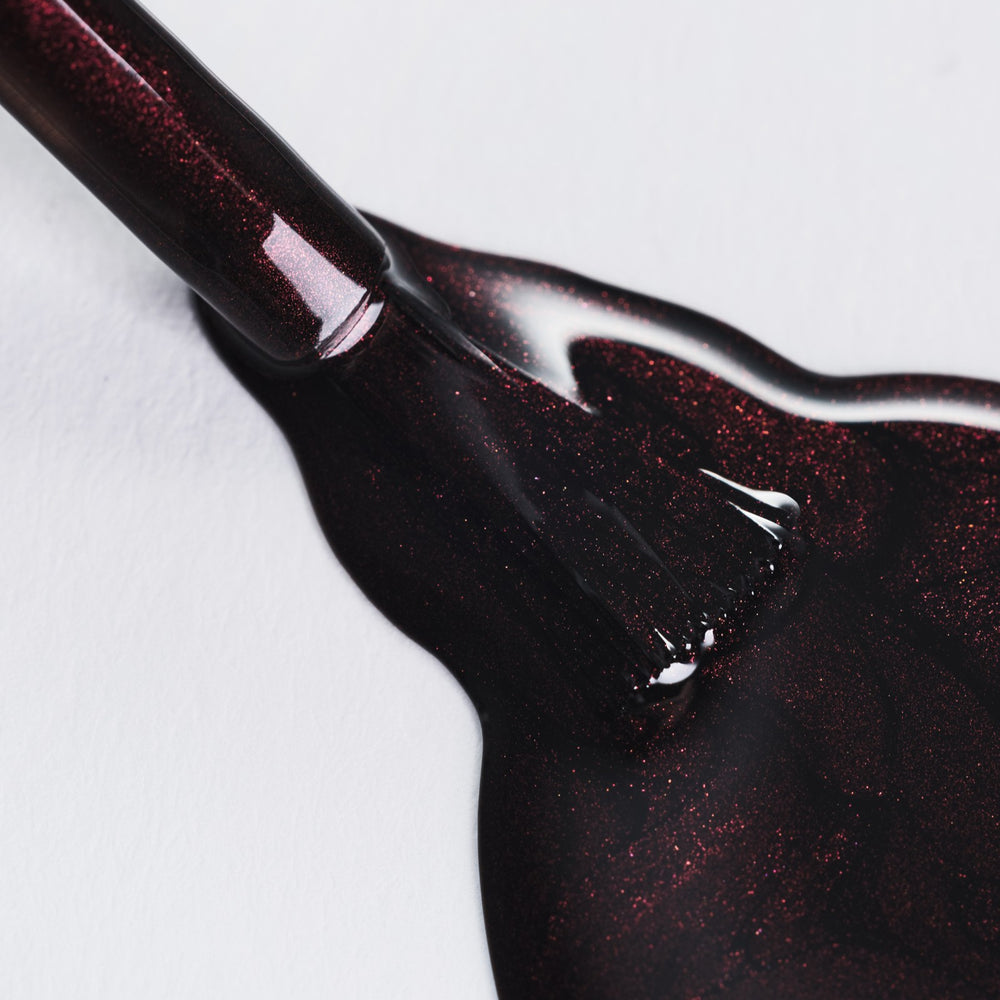 SSONE Crimson Smoke nail lacquer in a deep ember-inspired shade from the Limited Edition Embered Dusk collection.