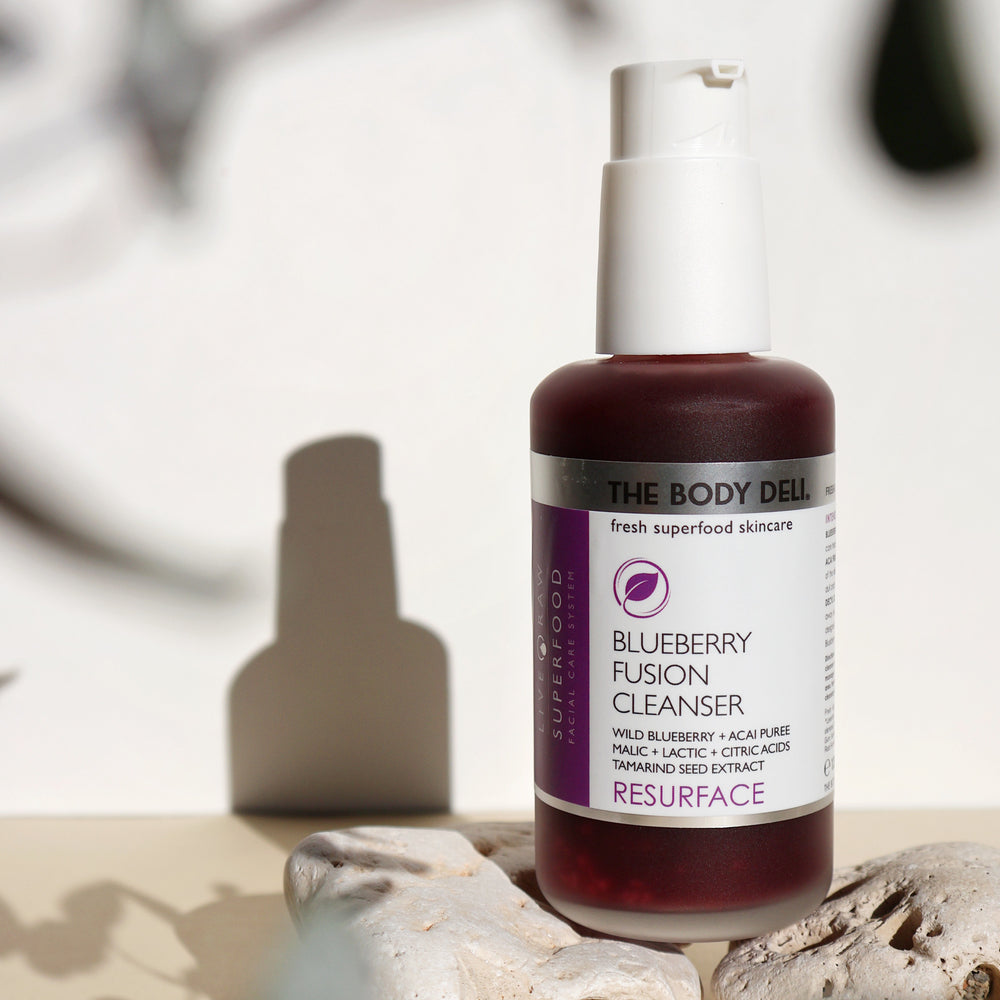 THE BODY DELI BLUEBERRY FUSION Cleanser – resurfacing facial cleanser with organic blueberry and acai, formulated with fruit-based exfoliating acids in a 4oz bottle.