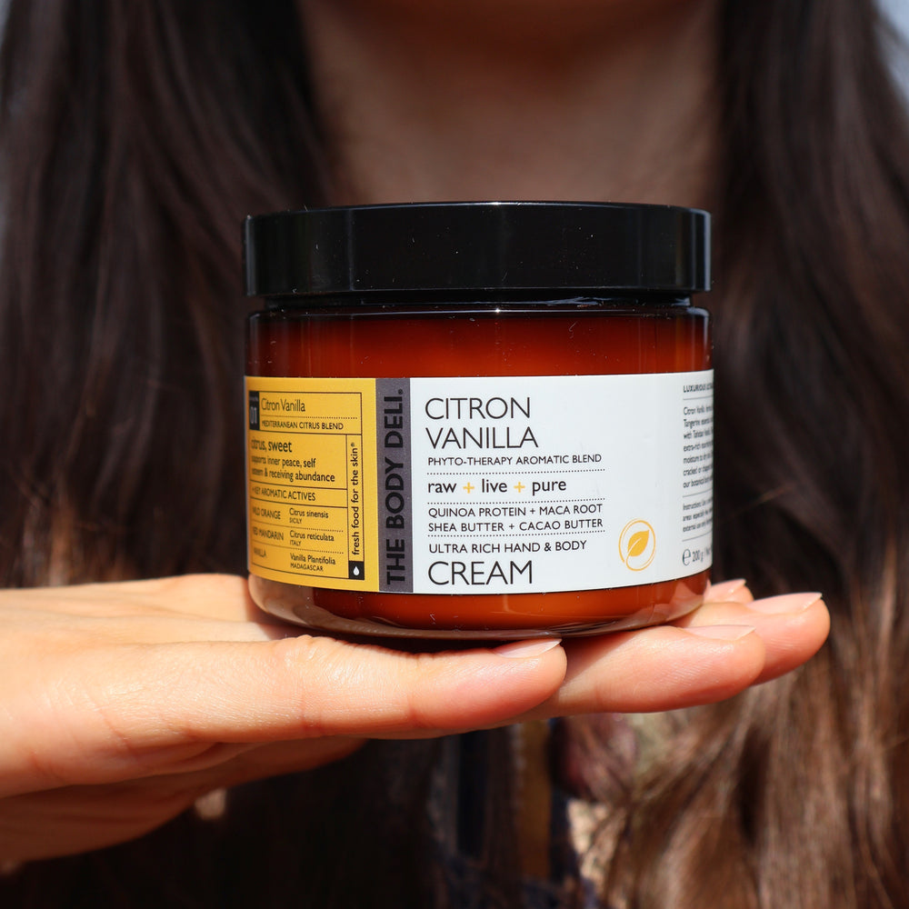 THE BODY DELI Citron Vanilla Hand & Body Cream – rich botanical body moisturizer with coconut water, shea butter, and citrus-vanilla essential oils in a 7oz jar.