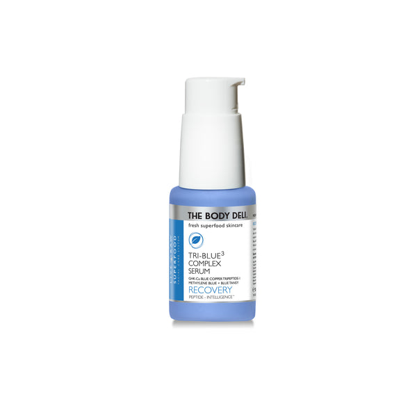 Skincare serum bottle labeled 'The Body Deli Tri-Blue³ Complex Serum' on a white background