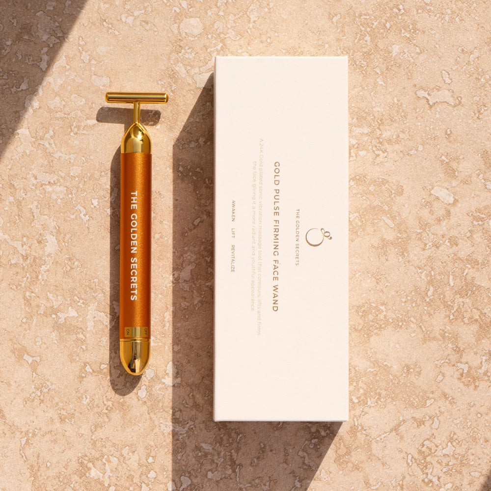 The Golden Secrets Gold Pulse Firming Face Wand with sonic vibrations for enhanced contouring, lifting, and skin revitalization.