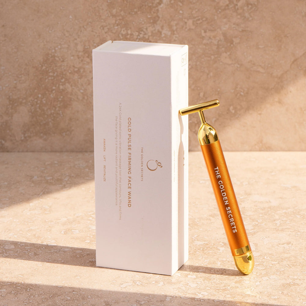 The Golden Secrets Gold Pulse Firming Face Wand with sonic vibrations for enhanced contouring, lifting, and skin revitalization.