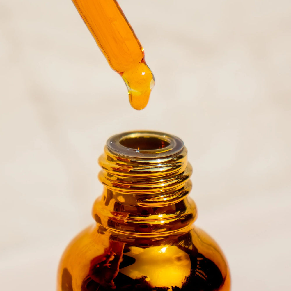 The Golden Secrets Youth Beauty Face Oil, an organic, nutrient-rich facial oil that rejuvenates, protects, and radiates a youthful glow. Infused with botanical ingredients like helichrysum, carrot seed, frankincense, and jojoba oil, it nourishes and enhances skin texture for a smoother, revitalized complexion.