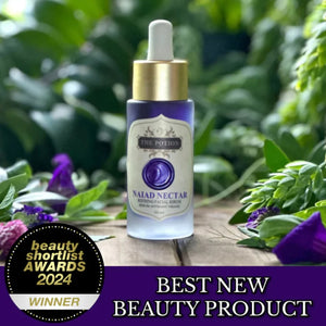 Naiad Nectar refining facial serum by The Potion Masters in clear glass dropper bottle.