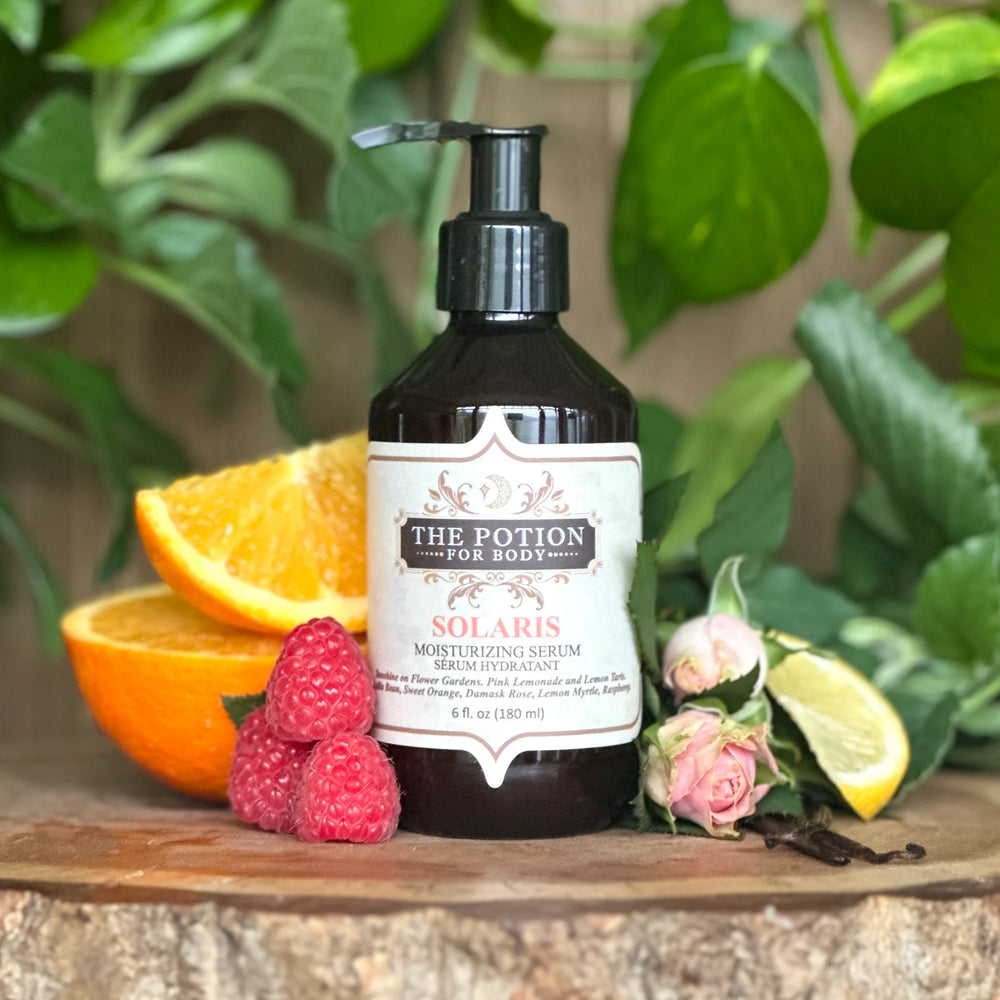 THE POTION MASTERS Solaris Body Potion – bright, citrusy body oil with sweet orange, rose, and vanilla.